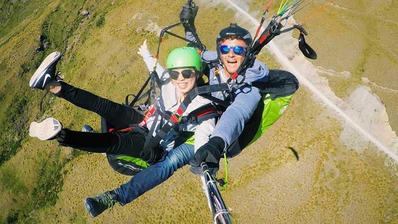 Experience an exhilarating big mountain paragliding flight with stunning views of Lake Wanaka!